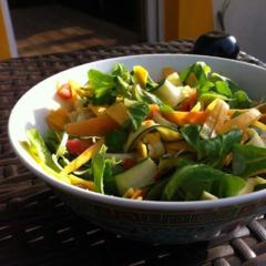 Corn sald, butternut, radish, carrot, zuchini with avocado and tomatoes massaged in