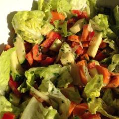 Creamy, sweet, tart and lush - carrots, zucchini, heart lettuce and yellow pepper with avocado cubes, lemon, some parsley and chives