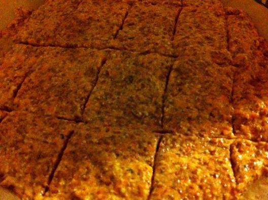 Some carrot, tomato, flax seeds crackers waiting in the dehydrator to get crunchy.