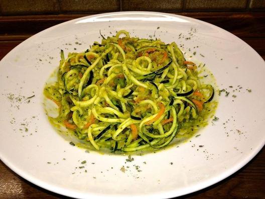 Some quick and delicious zucchini & carrot "noodles" with a sauce of yellow pepper, avocado, celery with a bit of lemon juice and some Italian herbs.