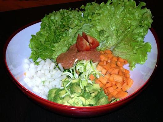 Zucchini, radish, carrots, avocado, lettuce salad with tomato & celery sauce
